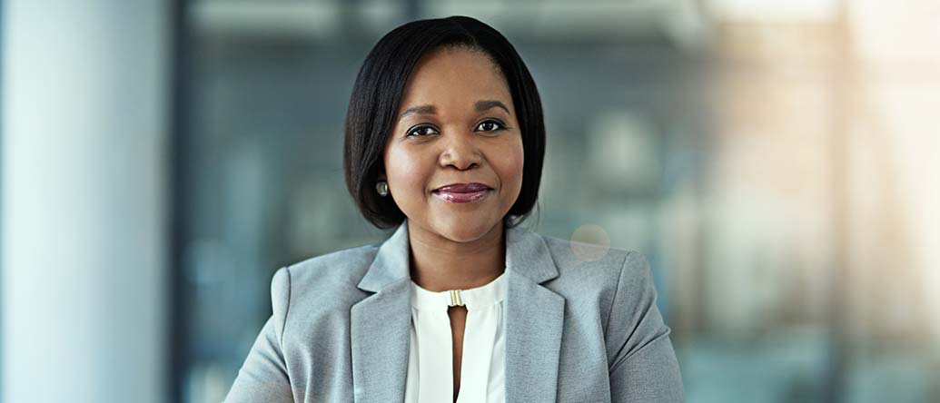 Confident businesswoman sitting in her office