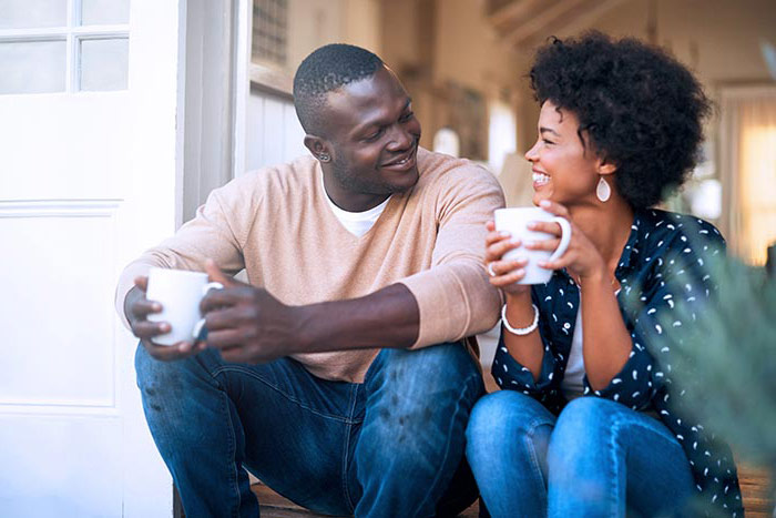Happy young couple spending time together outside