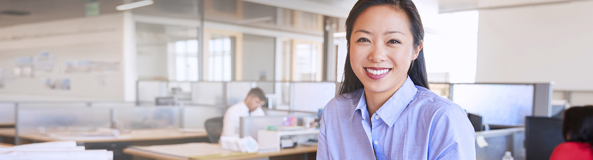 Young woman smiling at work