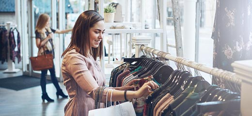 Young woman shopping at a clothing store