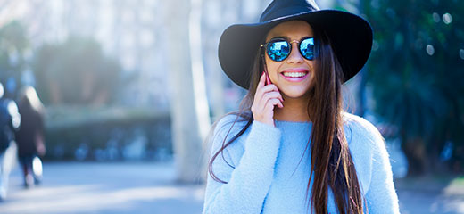 Young woman talking on mobile phone